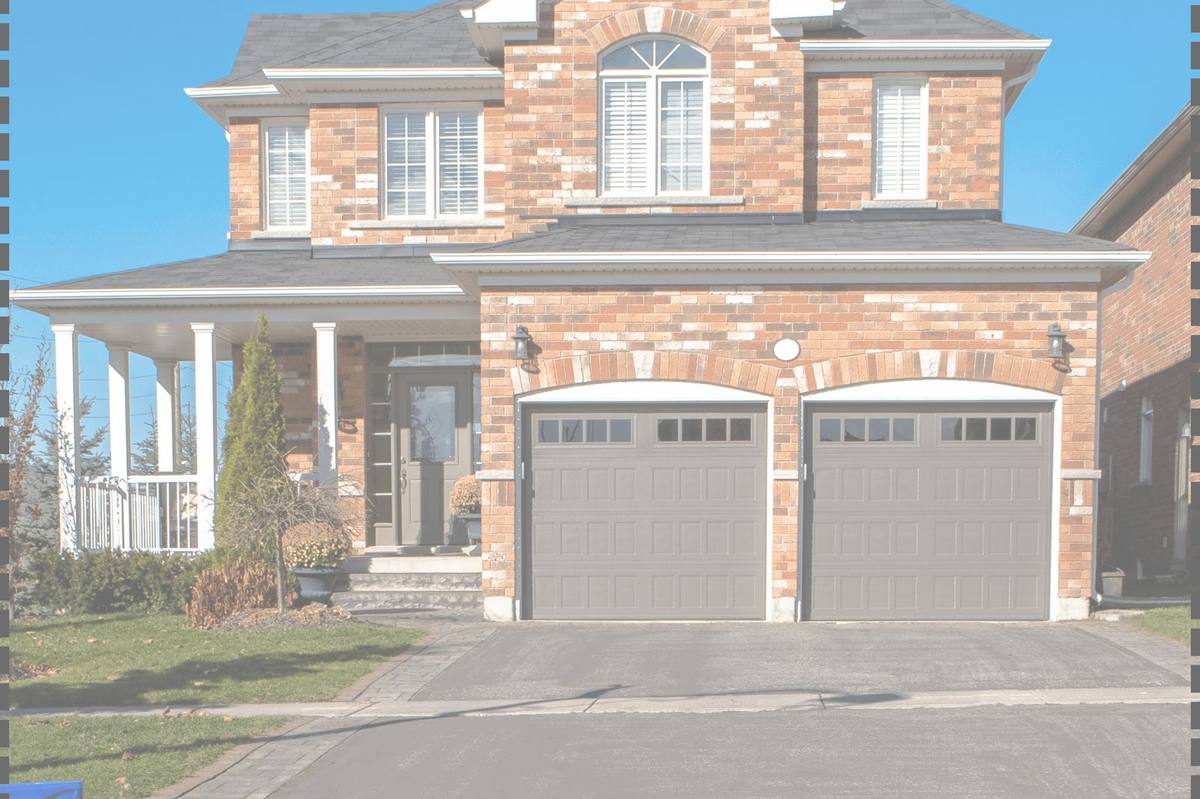 Home with double garage doors, duotone treated