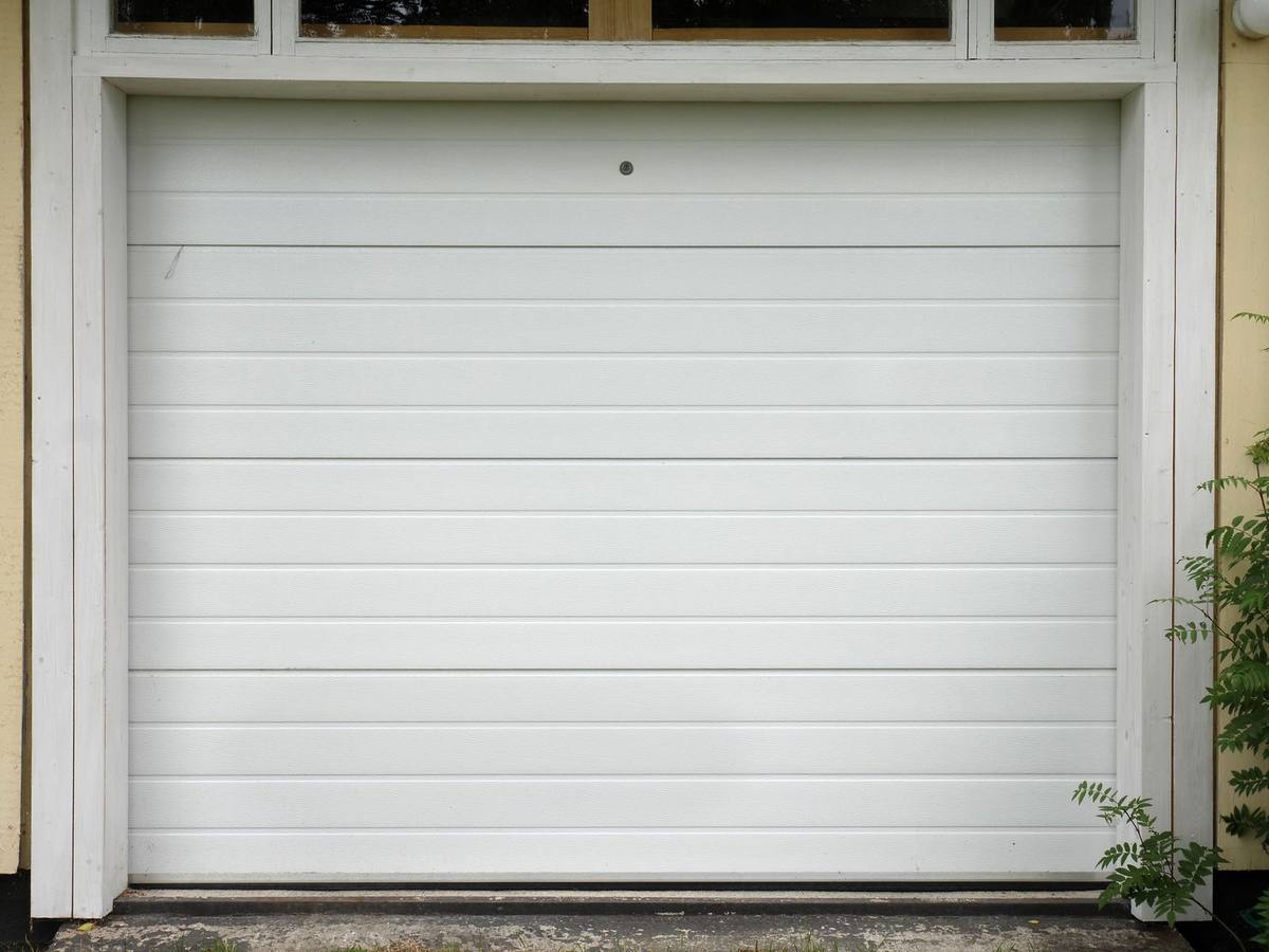 Sectional garage door panels, duotone treated